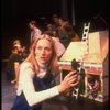 Meryl Streep (as Alice) (C) playing w. a doll house in a scene from the NY Shakespeare Festival production of the musical "Alice." (New York)