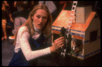 Meryl Streep (as Alice) (C) playing w. a doll house in a scene from the NY Shakespeare Festival production of the musical "Alice." (New York)