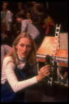 Meryl Streep (as Alice) (C) playing w. a doll house in a scene from the NY Shakespeare Festival production of the musical "Alice." (New York)