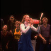 Meryl Streep (as Alice) dancing with a bottle that says "Drink Me" in a scene from the NY Shakespeare Festival production of the musical "Alice"