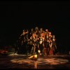 Cats singing near a large boot in a scene from the Broadway musical "Cats." (New York)