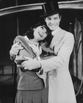 Actors Louis Jourdan and Lisa Howard in a scene from the stage production of the musical "Gigi"