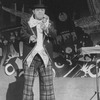 Stubby Kaye juggling in a scene from the Broadway production of the musical "Grind".