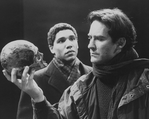 Kevin Kline as Hamlet (R, with skull) in a scene from the NY Shakespeare Festival production of the play "Hamlet".