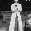 Actress Amy Irving clutching a book in a scene from the Circle In The Square production of the play "Heartbreak House".