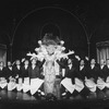 Carol Channing (C) with dancing waiters performing "Hello, Dolly!" in a scene from the revival tour of the Broadway production of the musical "Hello, Dolly!"
