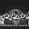 Dancing waiters aloft in a scene from the revival tour of the Broadway production of the musical "Hello, Dolly!"