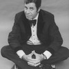 Comic Jerry Lewis sitting crosslegged in a promo shot for the pre-Broadway tour of the musical revue "Hellzapoppin".