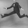 Comic Jerry Lewis mugging while flying in a promo shot for the pre-Broadway tour of the musical revue "Hellzapoppin".