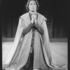 Actor Kevin Kline kneeling in prayer in a scene from the NY Shakespeare Festival Central Park production of the play "Henry V"