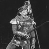 Actor Kevin Kline wielding a sword in a scene from the NY Shakespeare Festival Central Park production of the play "Henry V"
