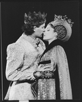 Actors Kevin Kline and Mary Elizabeth Mastrantonio about to kiss in a scene from the NY Shakespeare Festival Central Park production of the play "Henry V"
