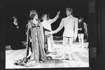 Actors Kevin Kline (2R), George N. Martin (C) and Mary Elizabeth Mastrantonio (2L) in a scene from the NY Shakespeare Festival Central Park production of the play "Henry V"