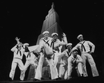 Scott Wise (2R), Michael Kubala (3L) and Robert La Fosse (C) with other sailors performing "New York, New York" from the musical "On The Town" in a scene from the Broadway production of the musical "Jerome Robbins' Broadway".