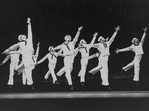 Scott Wise (L), Michael Kubala (2R) and Robert La Fosse (C) with other sailors performing "New York, New York" from the musical "On The Town" in a scene from the Broadway production of the musical "Jerome Robbins' Broadway".