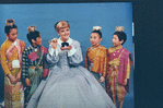 Angela Lansbury surrounded by children from the Broadway revival of the musical "The King And I"