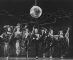 Peter Allen (C) kicking away in a scene from the Broadway production of the musical "Legs Diamond"