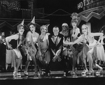 Peter Allen (C) in a scene from the Broadway production of the musical "Legs Diamond"
