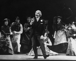 Milo O'Shea (C) in a scene from the Broadway revival of the musical "My Fair Lady".