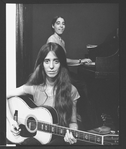 Composer Elizabeth Swados playing guitar (B) in a scene from the off-Broadway production of the musical "Nightclub Cantata"