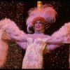 George Hearn in drag in a white costume w. a feather boa in a scene from the Broadway musical "La Cage Aux Folles." (New York)