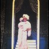 George Hearn in drag in a white costume w. a feather boa in a scene from the Broadway musical "La Cage Aux Folles." (New York)