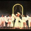 George Hearn (C) in drag in a white costume w. a feather boa in a scene from the Broadway musical "La Cage Aux Folles." (New York)