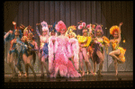 George Hearn (C) in drag in a pink maribou costume in a scene from the Broadway musical "La Cage Aux Folles." (New York)