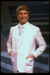 George Hearn in a white men's suit in a scene from the Broadway musical "La Cage Aux Folles." (New York)