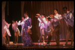 George Hearn (C) in a purple gown in a scene from the Broadway musical "La Cage Aux Folles." (New York)