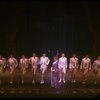 George Hearn (C) in a purple gown in a scene from the Broadway musical "La Cage Aux Folles." (New York)