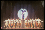 George Hearn (C, in a purple gown) on a swing in a scene from the Broadway musical "La Cage Aux Folles." (New York)