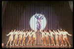 George Hearn (C, in a purple gown) on a swing in a scene from the Broadway musical "La Cage Aux Folles." (New York)