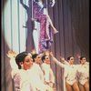 George Hearn (C, in a purple gown) on a swing in a scene from the Broadway musical "La Cage Aux Folles." (New York)
