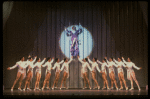 George Hearn (C, in a purple gown) on a swing in a scene from the Broadway musical "La Cage Aux Folles." (New York)