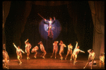 George Hearn (C, in a purple gown) on a swing in a scene from the Broadway musical "La Cage Aux Folles." (New York)