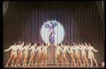 George Hearn (C, in a purple gown) on a swing in a scene from the Broadway musical "La Cage Aux Folles." (New York)