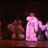 George Hearn in drag in a white costume w. a feather boa in a scene from the Broadway musical "La Cage Aux Folles." (New York)