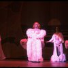 George Hearn in drag in a white costume w. a feather boa in a scene from the Broadway musical "La Cage Aux Folles." (New York)