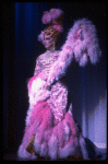 George Hearn in drag in a pink maribou costume in a scene from the Broadway musical "La Cage Aux Folles." (New York)