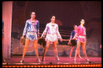 Male dancers in drag wearing sailor-style suits in a scene from the Broadway musical "La Cage Aux Folles." (New York)