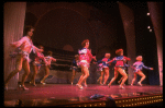 Male dancers in drag wearing sailor-style suits in a scene from the Broadway musical "La Cage Aux Folles." (New York)