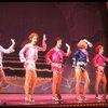 Male dancers in drag wearing sailor-style suits in a scene from the Broadway musical "La Cage Aux Folles." (New York)