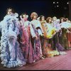 Male dancers in drag wearing hyper-ruffled costumes in a scene from the Broadway musical "La Cage Aux Folles." (New York)