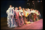 Male dancers in drag wearing hyper-ruffled costumes in a scene from the Broadway musical "La Cage Aux Folles." (New York)