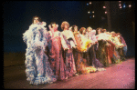 Male dancers in drag wearing hyper-ruffled costumes in a scene from the Broadway musical "La Cage Aux Folles." (New York)