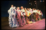 Male dancers in drag wearing hyper-ruffled costumes in a scene from the Broadway musical "La Cage Aux Folles." (New York)