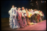 Male dancers in drag wearing hyper-ruffled costumes in a scene from the Broadway musical "La Cage Aux Folles." (New York)