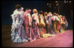 Male dancers in drag wearing hyper-ruffled costumes in a scene from the Broadway musical "La Cage Aux Folles." (New York)