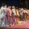 Male dancers in drag wearing hyper-ruffled costumes in a scene from the Broadway musical "La Cage Aux Folles." (New York)